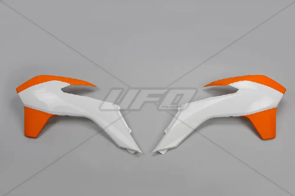 UFO kryty chladiče KTM SX/SXF 13-15, EXC 14-16 barva bílá/oranžová Cenová Bomba